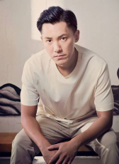 張颕康