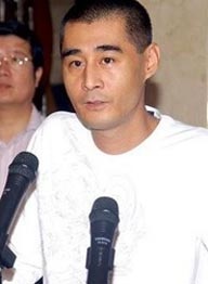 傅东育