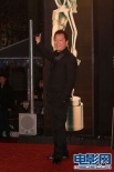 廖啟智黑色西裝從容亮相 信步登場表情搞怪