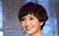 “小天后”郭采洁浅蓝短衫显清纯 选男友不看长相