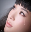 黄圣依黑纱蓬蓬裙拍写真 流泪露美背我见犹怜