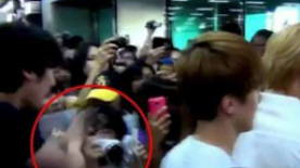 韩国SM公司经纪人动粗引反响 公然殴打女粉丝被拍