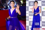 “小恩熙”已經(jīng)出落成大姑娘，文根英不斷以成熟形象示人。在釜山電影節(jié)開幕紅毯上，文根英身著寶藍(lán)色深V長裙亮相，簡潔、大方，但是對于她的年齡來說略顯成熟，趁年輕應(yīng)該嘗試多些風(fēng)格嘛！