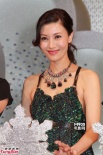 李嘉欣短裙黑絲性感 否認懷孕稱生孩子看天意