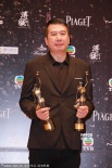 《一代宗师》获最佳美术指导 邱伟明捧杯微笑