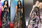 Escada2014秋冬系列鮮花印花長裙讓湯唯徹底成為文藝女王，油彩的隨性恰如其分地展現(xiàn)出湯唯的性感嫵媚，但長披肩的凌亂發(fā)型缺乏精致感，為本身就為秋冬設(shè)計(jì)的抹胸裙擺更顯沉重。