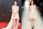 Blumarine2014春夏系列羽毛花朵抹胸長裙為金馬影后張榕容帶來絲絲空靈感，襯得混血的白皙肌膚吹彈可破，前短后長的拖尾設(shè)計(jì)讓美腿一覽無遺。