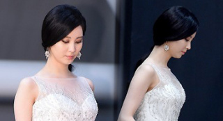 烂裙毁女神红毯超尴尬 少时徐玄边走边掉白色物体