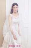 张馨予披婚纱拍梦幻新娘写真 简约典雅美轮美奂