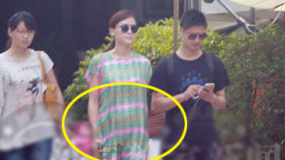 叶一茜小腹隆起现身知名医院 田亮随行呵护倍加