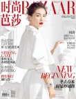 劉濤開年寫真大片 身著高開叉黑白裙與雕塑共舞