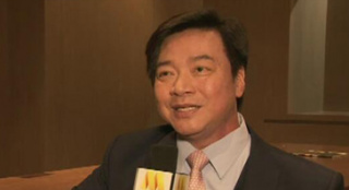 與成龍同天生日多次合作 解讀唐季禮的愛國情結