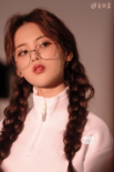 杨超越大片曝光 白色运动服羊角辫造型似精致娃娃