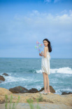 美人鱼上岸！林允海边清凉写真 风吹发丝拂动心弦