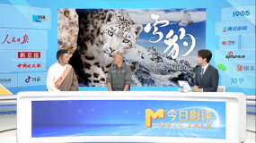 奚志農和更求曲朋因雪豹結緣