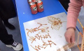 糖画字手艺人现场制作 “人间至乐是家乡”图案